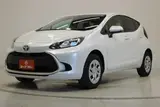 2025 Toyota Aqua 1.5 G 4WD White Sedan for sale, Japanese used car export - photo 8 of 30 | GULJI TRADERS