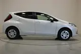 2025 Toyota Aqua 1.5 G 4WD White Sedan for sale, Japanese used car export - photo 13 of 30 | GULJI TRADERS