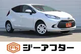 2025 Toyota Aqua 1.5 G E-FOUR 4WD White Sedan for sale, Japanese used car export - photo 1 of 30 | GULJI TRADERS
