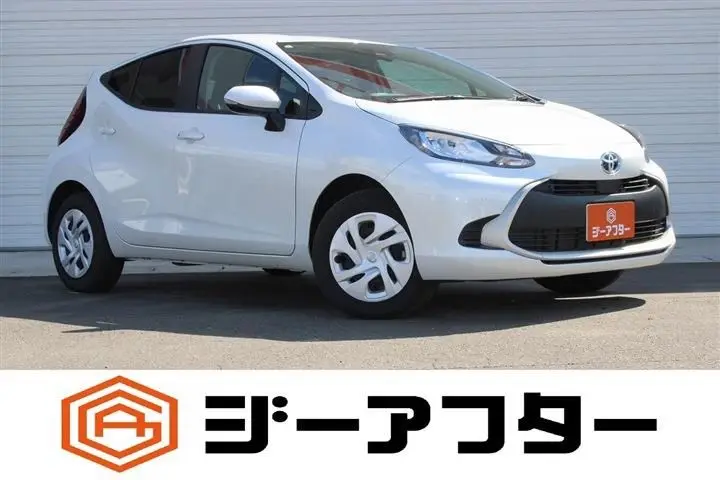 2025 Toyota Aqua 1.5 G E-FOUR 4WD - photo 1 2025 Toyota Aqua 1.5 G E-FOUR 4WD White Sedan for sale, Japanese used car export - photo 1 of 30 | GULJI TRADERS