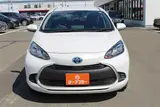 2025 Toyota Aqua 1.5 G E-FOUR 4WD White Sedan for sale, Japanese used car export - photo 8 of 30 | GULJI TRADERS