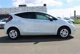 2025 Toyota Aqua 1.5 G E-FOUR 4WD White Sedan for sale, Japanese used car export - photo 10 of 30 | GULJI TRADERS