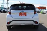 2025 Toyota Aqua 1.5 G E-FOUR 4WD White Sedan for sale, Japanese used car export - photo 12 of 30 | GULJI TRADERS