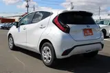 2025 Toyota Aqua 1.5 G E-FOUR 4WD White Sedan for sale, Japanese used car export - photo 13 of 30 | GULJI TRADERS