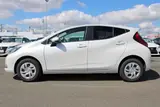 2025 Toyota Aqua 1.5 G E-FOUR 4WD White Sedan for sale, Japanese used car export - photo 14 of 30 | GULJI TRADERS