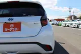 2025 Toyota Aqua 1.5 G E-FOUR 4WD White Sedan for sale, Japanese used car export - photo 20 of 30 | GULJI TRADERS