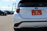 2025 Toyota Aqua 1.5 G E-FOUR 4WD White Sedan for sale, Japanese used car export - photo 22 of 30 | GULJI TRADERS