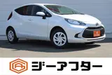 2025 Toyota Aqua 1.5 G E-FOUR 4WD White Sedan for sale, Japanese used car export - photo 1 of 30 | GULJI TRADERS