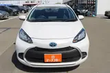 2025 Toyota Aqua 1.5 G E-FOUR 4WD White Sedan for sale, Japanese used car export - photo 8 of 30 | GULJI TRADERS
