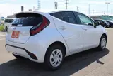 2025 Toyota Aqua 1.5 G E-FOUR 4WD White Sedan for sale, Japanese used car export - photo 11 of 30 | GULJI TRADERS