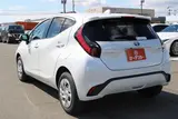 2025 Toyota Aqua 1.5 G E-FOUR 4WD White Sedan for sale, Japanese used car export - photo 13 of 30 | GULJI TRADERS