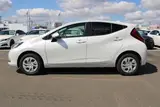 2025 Toyota Aqua 1.5 G E-FOUR 4WD White Sedan for sale, Japanese used car export - photo 14 of 30 | GULJI TRADERS