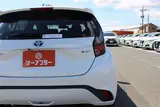 2025 Toyota Aqua 1.5 G E-FOUR 4WD White Sedan for sale, Japanese used car export - photo 20 of 30 | GULJI TRADERS