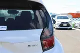 2025 Toyota Aqua 1.5 G E-FOUR 4WD White Sedan for sale, Japanese used car export - photo 21 of 30 | GULJI TRADERS