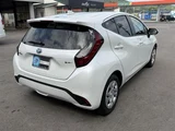 2025 Toyota Aqua 1.5 X Sedan for sale, Japanese used car export - photo 2 of 30 | GULJI TRADERS