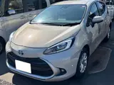 2025 Toyota Aqua 1.5 Z Brown Sedan for sale, Japanese used car export - photo 1 of 20 | GULJI TRADERS