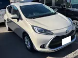 2025 Toyota Aqua 1.5 Z Brown Sedan for sale, Japanese used car export - photo 2 of 20 | GULJI TRADERS