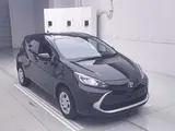 2025 Toyota Aqua 4WD G Black Sedan for sale, Japanese used car export - photo 1 of 11 | GULJI TRADERS