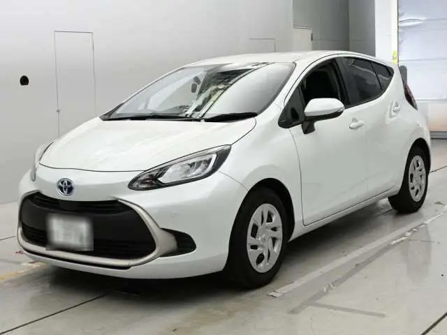 2025 Toyota Aqua G - photo 1 2025 Toyota Aqua G Pearl Sedan for sale, Japanese used car export - photo 1 of 12 | GULJI TRADERS