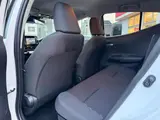 2025 Toyota Aqua 1.5 G E-Four 4WD Pearl Sedan for sale, Japanese used car export - photo 18 of 20 | GULJI TRADERS