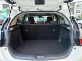 2025 Toyota Aqua 1.5 G E-Four 4WD Pearl Sedan for sale, Japanese used car export - photo 19 of 20 | GULJI TRADERS