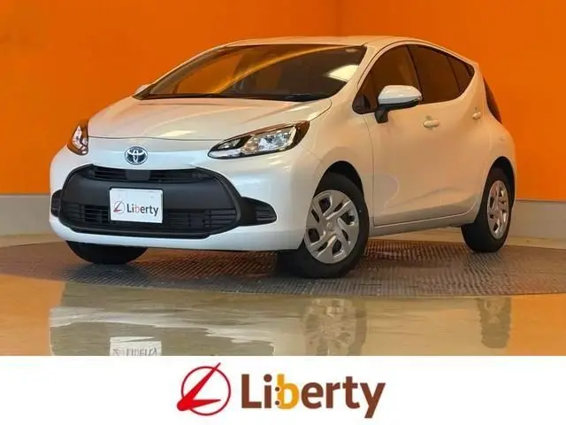 2025 Toyota Aqua X White Sedan for sale, Japanese used car export - photo 1 of 9 | GULJI TRADERS