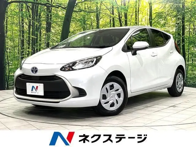 2025 Toyota Aqua G White Sedan for sale, Japanese used car export - photo 1 of 9 | GULJI TRADERS