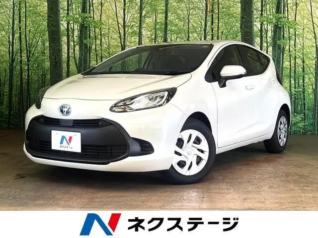 2025 Toyota Aqua X White Sedan for sale, Japanese used car export - photo 1 of 9 | GULJI TRADERS