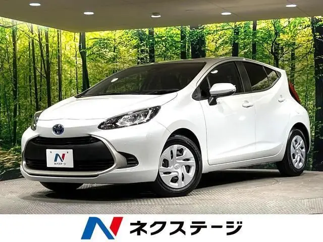 2025 Toyota Aqua G - photo 1 2025 Toyota Aqua G White Sedan for sale, Japanese used car export - photo 1 of 9 | GULJI TRADERS