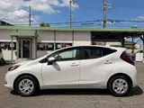 2025 Toyota Aqua G White Sedan for sale, Japanese used car export - photo 5 of 9 | GULJI TRADERS