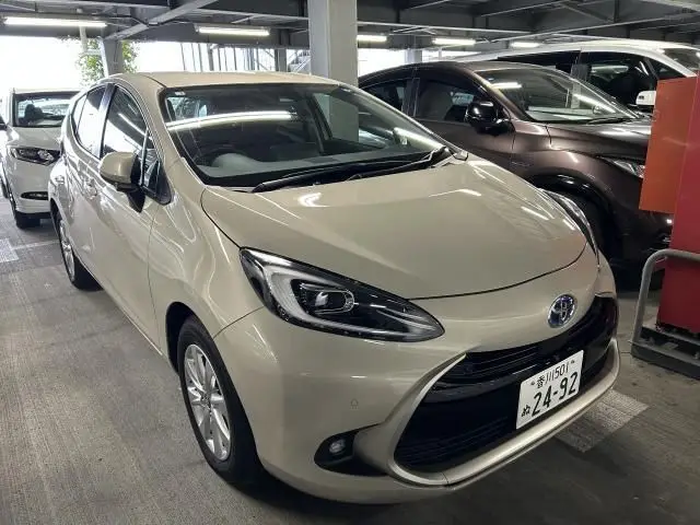 2025 Toyota Aqua Z Brown Sedan for sale, Japanese used car export | GULJI TRADERS