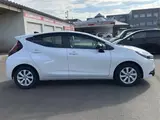 2026 Toyota Aqua Z Pearl Sedan for sale, Japanese used car export - photo 24 of 30 | GULJI TRADERS