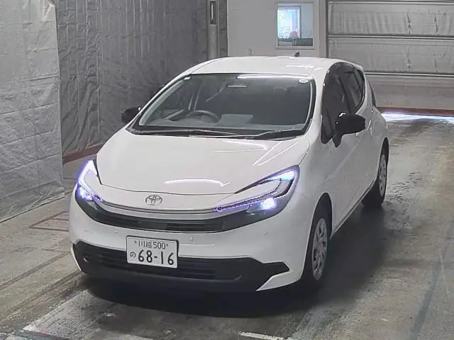 2026 Toyota Aqua X White Sedan for sale, Japanese used car export - photo 1 of 8 | GULJI TRADERS