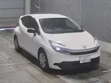 2026 Toyota Aqua X White Sedan for sale, Japanese used car export - photo 6 of 8 | GULJI TRADERS