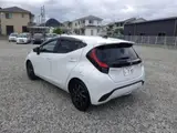 2026 Toyota Aqua Z Pearl Sedan for sale, Japanese used car export - photo 2 of 3 | GULJI TRADERS