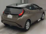 2026 Toyota Aqua Z Brown Sedan for sale, Japanese used car export - photo 2 of 15 | GULJI TRADERS
