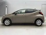 2026 Toyota Aqua Z Brown Sedan for sale, Japanese used car export - photo 5 of 15 | GULJI TRADERS