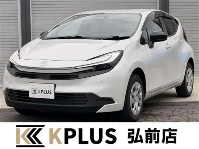2026 Toyota Aqua 1.5 X E-FOUR 4WD White Sedan for sale, Japanese used car export | GULJI TRADERS