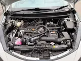 2026 Toyota Aqua 1.5 X E-FOUR 4WD White Sedan for sale, Japanese used car export - photo 38 of 40 | GULJI TRADERS