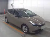 2026 Toyota Aqua Z Brown Sedan for sale, Japanese used car export - photo 6 of 6 | GULJI TRADERS