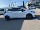2026 Toyota Aqua 1.5 Z Pearl Sedan for sale, Japanese used car export - photo 5 of 9 | GULJI TRADERS