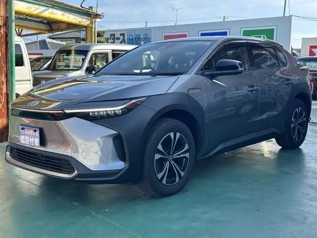 2023 Toyota BZ4X Z 4WD genuine navigation system, omnidirectional camera, JBL audio Gray SUV for sale, Japanese used car export | GULJI TRADERS