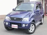 2004 Toyota Cami 1300Q / Side steps / Rear spoiler / Aluminum wheels / Spare spare tire / 4WD Blue Sedan for sale, Japanese used car export - photo 4 of 50 | GULJI TRADERS
