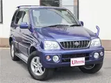 2004 Toyota Cami 1300Q / Side steps / Rear spoiler / Aluminum wheels / Spare spare tire / 4WD Blue Sedan for sale, Japanese used car export - photo 5 of 50 | GULJI TRADERS