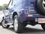2004 Toyota Cami 1300Q / Side steps / Rear spoiler / Aluminum wheels / Spare spare tire / 4WD Blue Sedan for sale, Japanese used car export - photo 6 of 50 | GULJI TRADERS