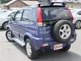 2004 Toyota Cami 1300Q / Side steps / Rear spoiler / Aluminum wheels / Spare spare tire / 4WD Blue Sedan for sale, Japanese used car export - photo 7 of 50 | GULJI TRADERS