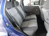 2004 Toyota Cami 1300Q / Side steps / Rear spoiler / Aluminum wheels / Spare spare tire / 4WD Blue Sedan for sale, Japanese used car export - photo 9 of 50 | GULJI TRADERS