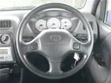2004 Toyota Cami 1300Q / Side steps / Rear spoiler / Aluminum wheels / Spare spare tire / 4WD Blue Sedan for sale, Japanese used car export - photo 13 of 50 | GULJI TRADERS