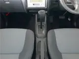 2004 Toyota Cami 1300Q / Side steps / Rear spoiler / Aluminum wheels / Spare spare tire / 4WD Blue Sedan for sale, Japanese used car export - photo 16 of 50 | GULJI TRADERS