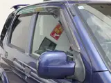 2004 Toyota Cami 1300Q / Side steps / Rear spoiler / Aluminum wheels / Spare spare tire / 4WD Blue Sedan for sale, Japanese used car export - photo 28 of 50 | GULJI TRADERS